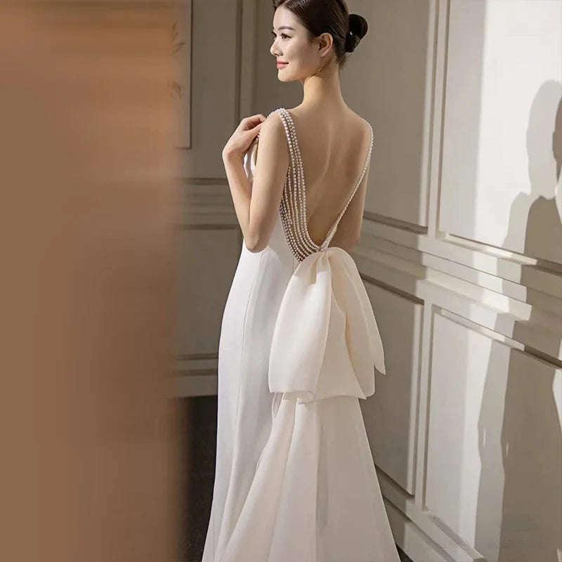 French strap light wedding dress simple elegant satin backless fishtail welcome wedding veil Super fairy strappy dress