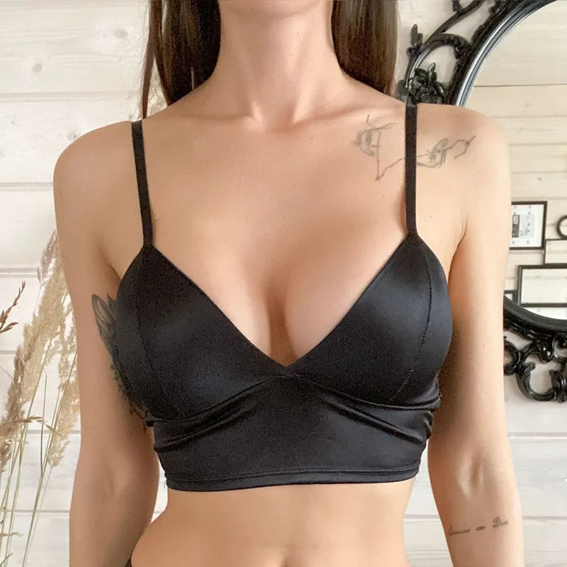 Satin Sensation Bralette: Sexy Crop Top with Wireless Design. Spaghetti Straps, Crocheted Detail, and Chest Padding for Flair.