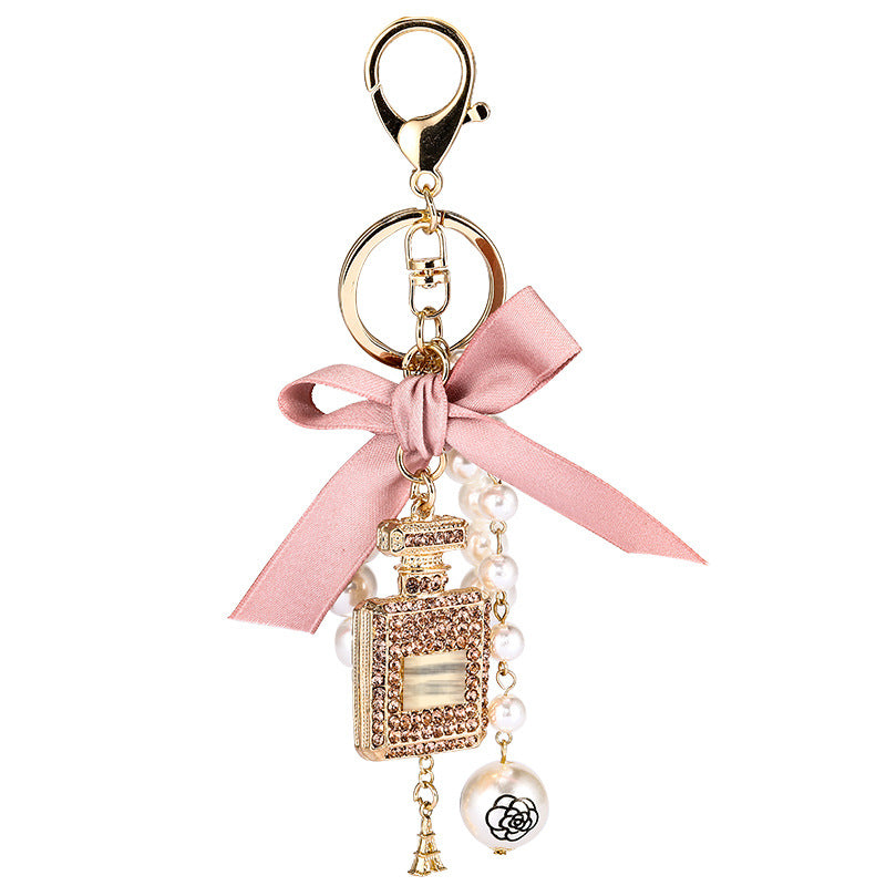 Essence Elysium: Creative Crystal Perfume Bottle Rhinestone Keychain.