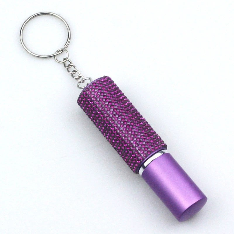 Essence Elysium: Keychain Perfume Bottle - Fragrance on the Go.