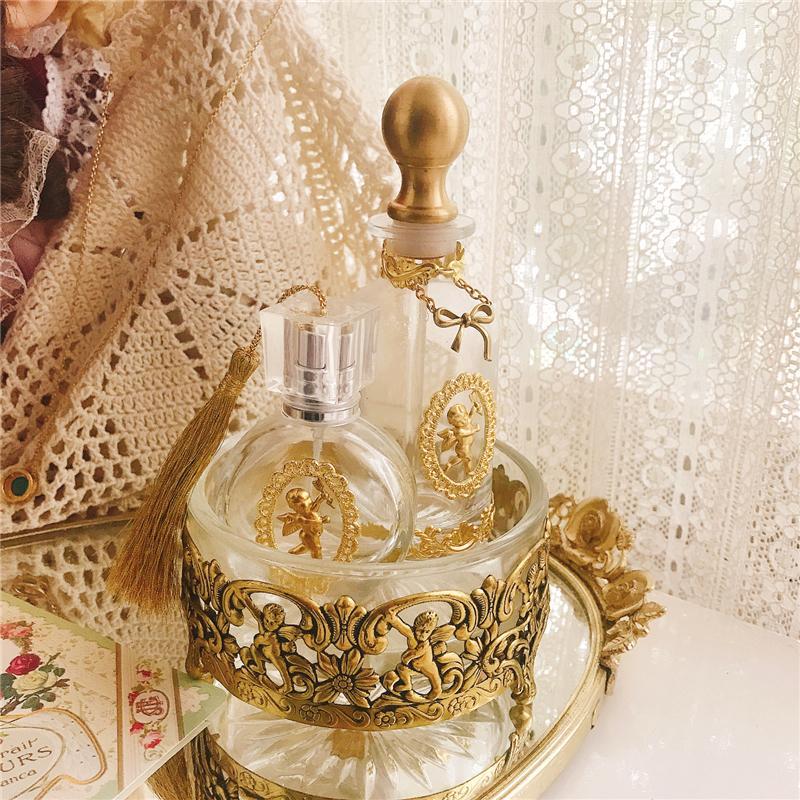 Essence Elysium: French Angel Vintage Perfume Bottle.