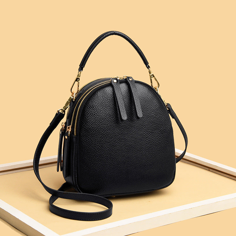 LuxeAura: The Top Layer Cowhide Leather Chain Bag, a symbol of timeless sophistication and style.