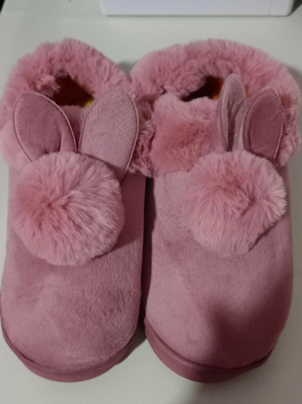 CozyPaws: Warm, fluffy cotton slippers with rabbit fur for a cute winter look.