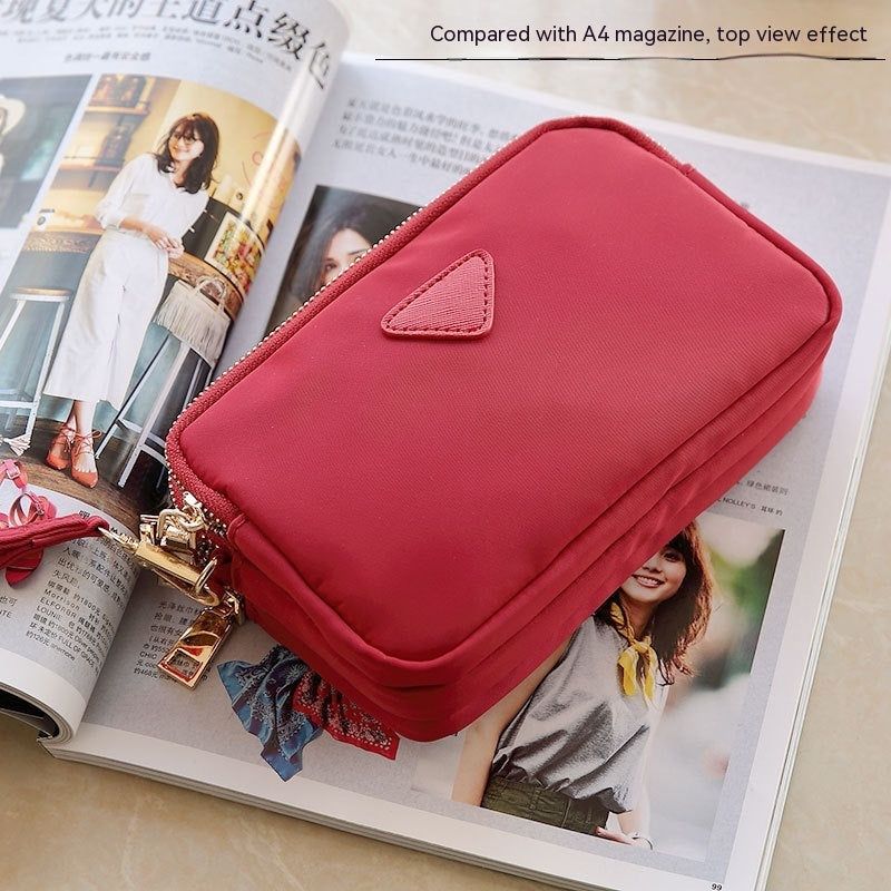 LuxeAura: The Triple Zipper Mini Square Bag, a sleek and compact accessory designed for style and convenience.