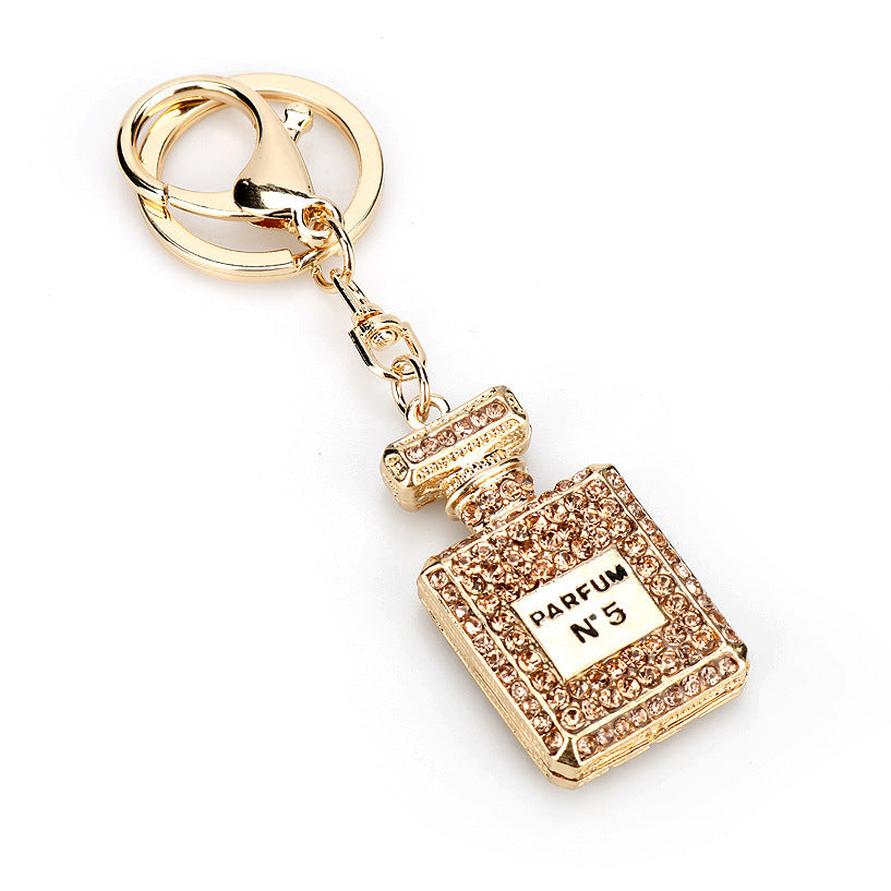 Essence Elysium: Creative Crystal Perfume Bottle Rhinestone Keychain.