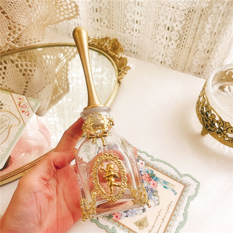 Essence Elysium: French Angel Vintage Perfume Bottle.